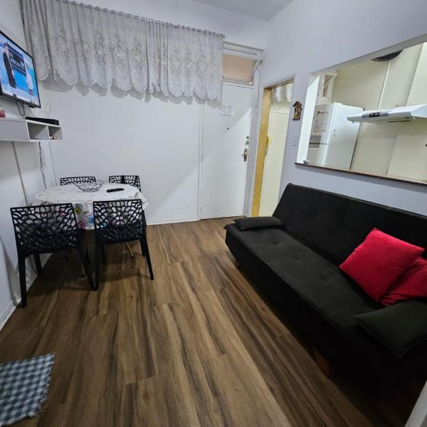 Apartamento em frente ao mar, pé na areia.