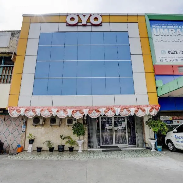 Hotel O Wisma Sartika, отель в городе Lhokseumawe