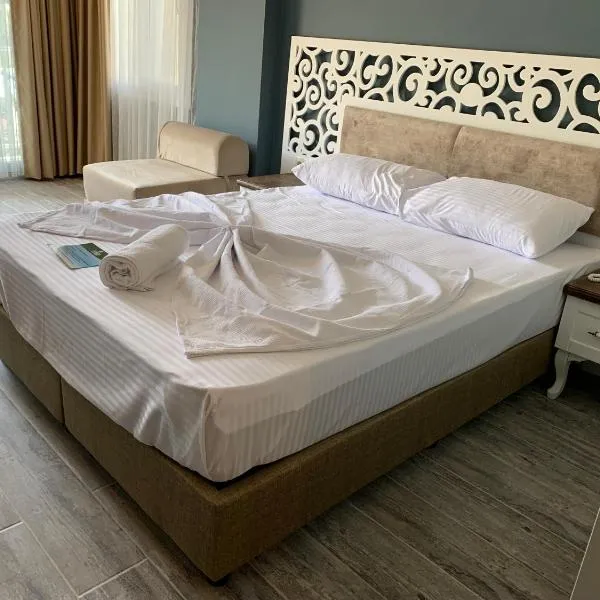 KUPALA BEACH HOTEL, hotel Büyükkeçeli városában