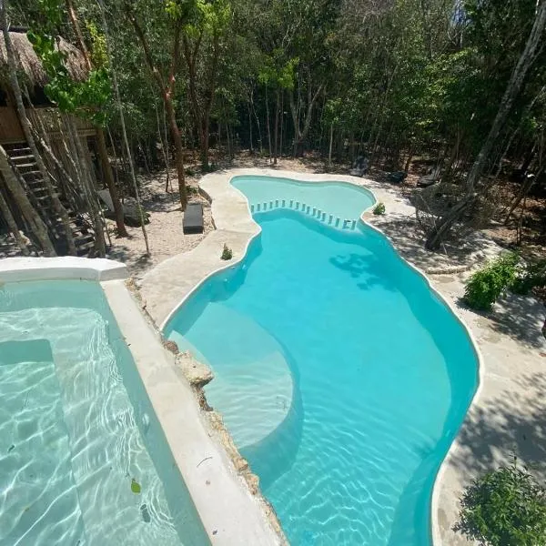 Aldea Maya-Ha Cabañas con cenotes, hotel v destinaci Puerto Morelos