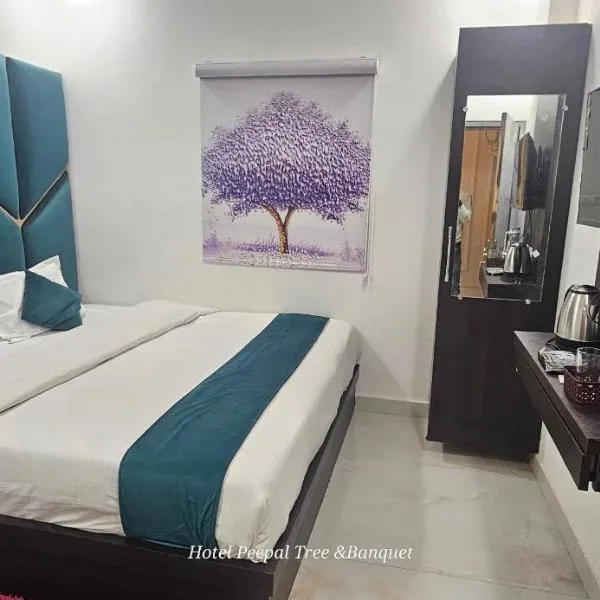 HOTEL PEEPAL#TREE Near Rambag Railway Station -Free Parking And Wi-fi Facilities - A Top Rated Hotel, hotel in Prayagraj