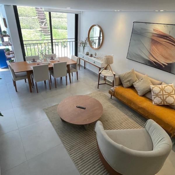 Duplex a 500 metros do baden baden- 2 suites- wifi - 2 vagas de garagem