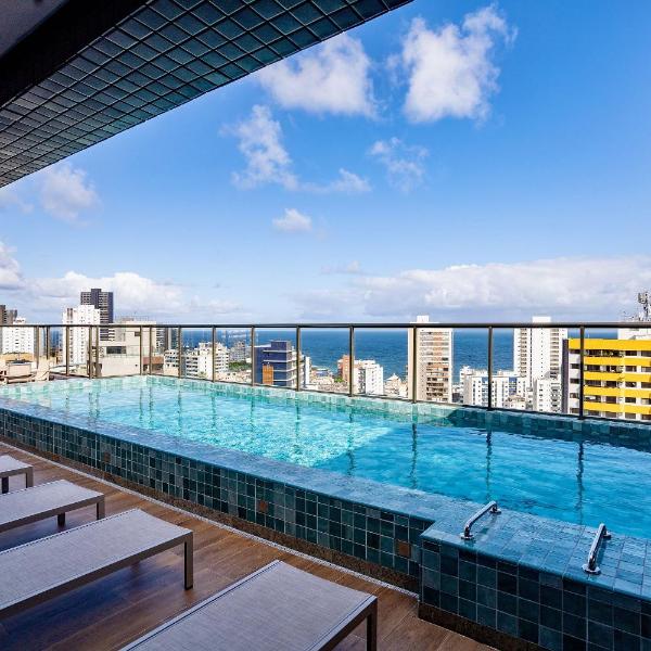 Condomínio com Piscina e Sauna no Coração da Barra