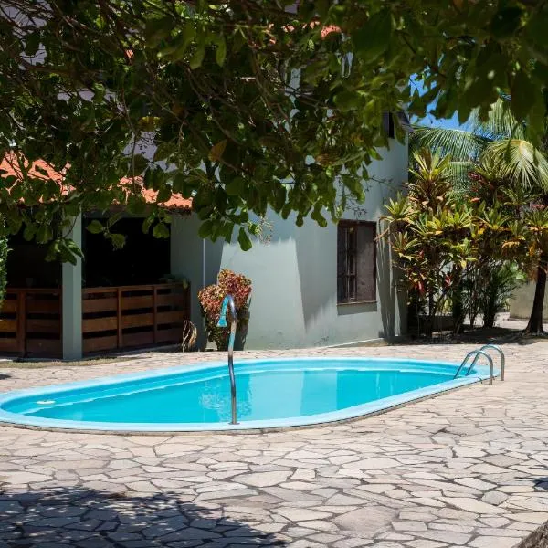 Casasveraneio casa top com 2 suítes com ar condicionado a 100 m da Praia - Barra de São Miguel, 7 minutos do gunga e 3 da praia bonita e conchas ! Área gourmet particular com churrasqueira , chuveirão !condomínio com muito verde,piscina de 10m!, hotel v destinaci Barra de São Miguel