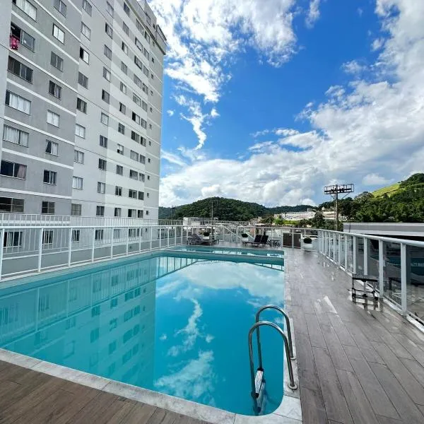 Apartamento de 2 Quartos com Piscina e Academia e Garagem Brinquedoteca, hotel in Juiz de Fora