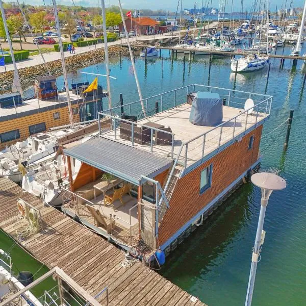 Hausboot - Stina, Hotel in Heiligenhafen