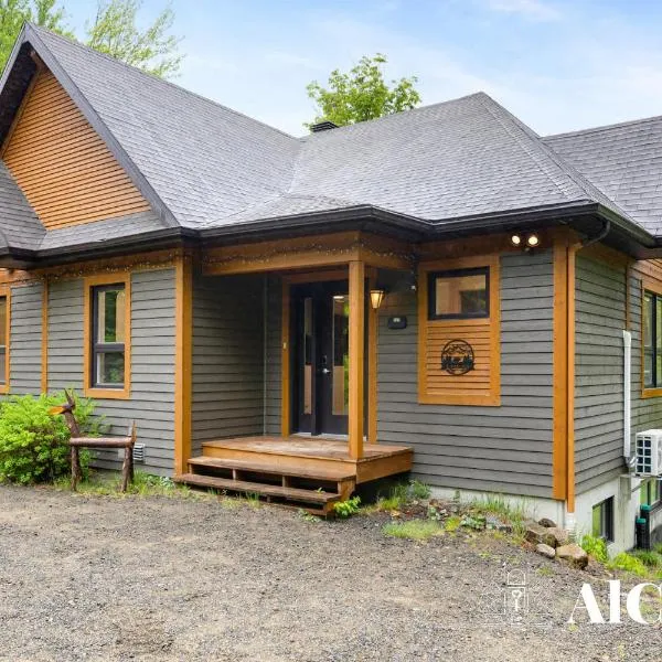 L'ours de Charlevoix - Chalet proche du Massif avec spa, hotel in Petite-Rivière-Saint-François