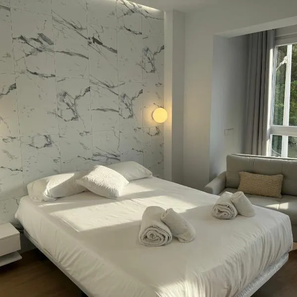 Design and style next to Playa de Valencia, hotel en Valencia