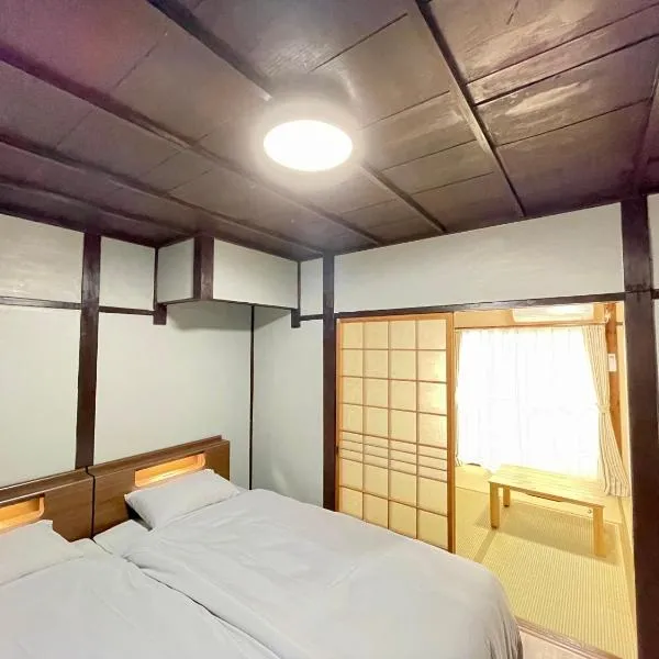 サニーサイドホステル1号館، فندق في يوجي