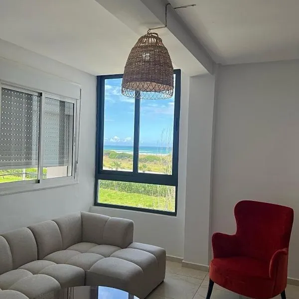 Appartement, en bord de mer, hotel in Al Houara