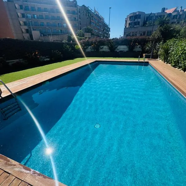 Elegante piso de sueños con piscina, hotel in Lloret de Mar
