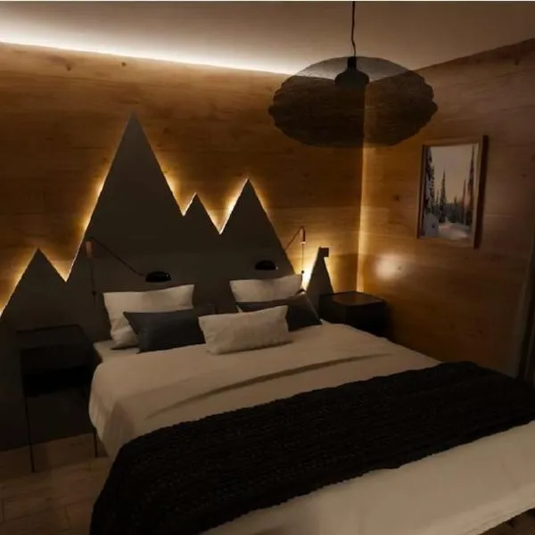 Appartement ambiance chalet avec vidéo-projecteur, hotel em Morez