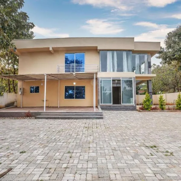 Villa ExoticaD by StayJadePoolProjectorBBQ5BHK, ξενοδοχείο σε Denkanikota