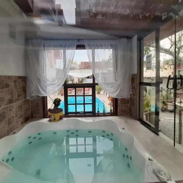 Pousada Cantinho de Minas Da Tânia, hotel di Cabo Frio