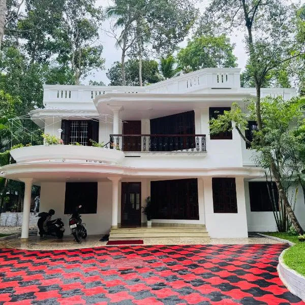 Niharika Homestay, hotel v destinaci Neyyāttinkara