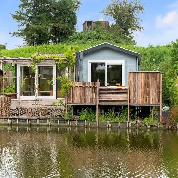 The Blue House - Heerlijk aan het Water – hotel w mieście Ooltgensplaat