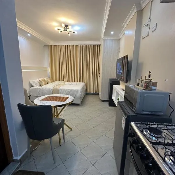 Pamoja stays - Modern studio near transit with balcony and workspace, hotel in Rungiri