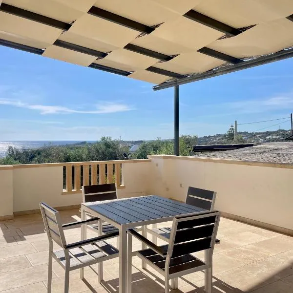 CASA ELAIO - immersa negli ulivi con vista sul mare Ionio, hotel in Marina San Gregorio