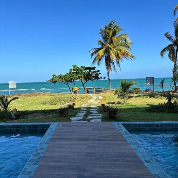 Pe na areia Carneiros Flat