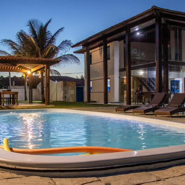 Casarão de vidro - Pé na Areia - Praia Enseada dos Corais