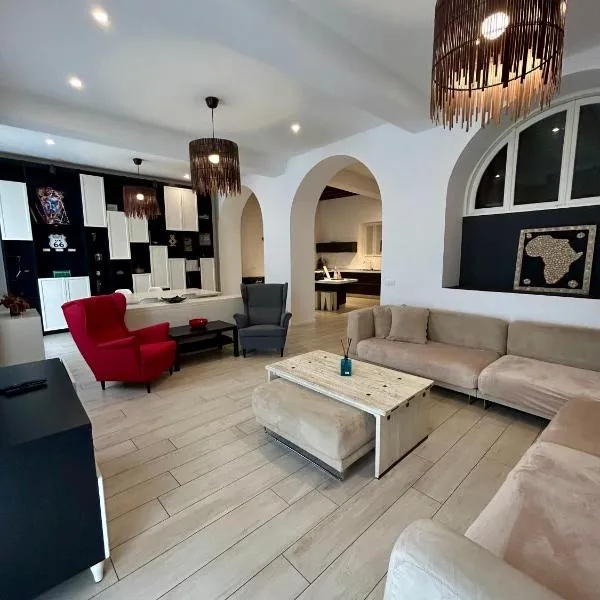 A Casa di Lamu, eleganza in Piazza della Vittoria, 140mq, hotel in Pavia