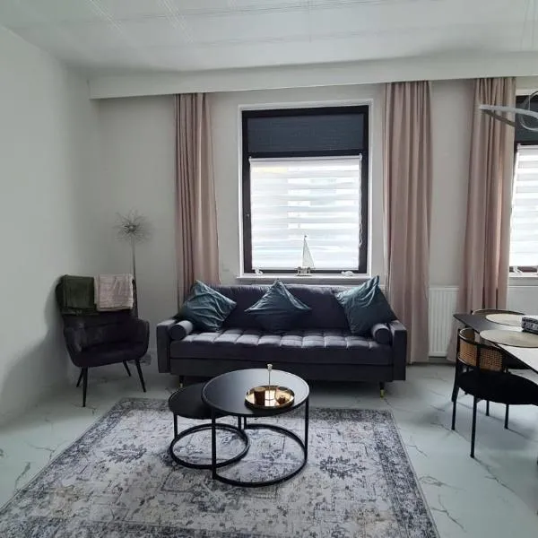 Deichliebe 2 - Modern, Zentral & Familienfreundlich - Inklusive privater Stellplatz im Parkhaus 2min zu Fuß entfernt, hotel in Bremerhaven