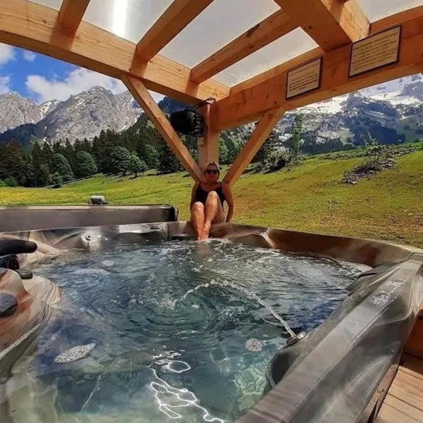 Chalet Inarpa - Appartements et Suites, hotel en La Clusaz