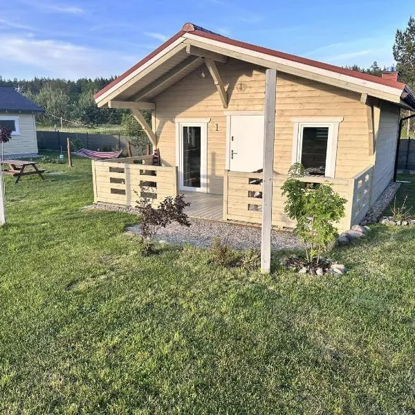 Wczasy Pod Sosnami domek z kominkiem: Krutyń şehrinde bir otel