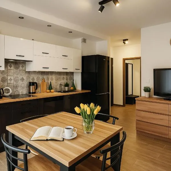 Sunny Apartament – hotel w mieście Darłowo