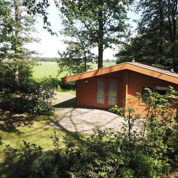 Houten huisje 7 voor Rust, Ruimte en Natuur, hotel em Neede