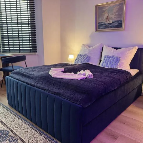 CuxHeaven - modernes Studio-Apartment direkt am Meer mit 65 Zoll TV und Tiefgarage in Duhnen, hotell sihtkohas Cuxhaven