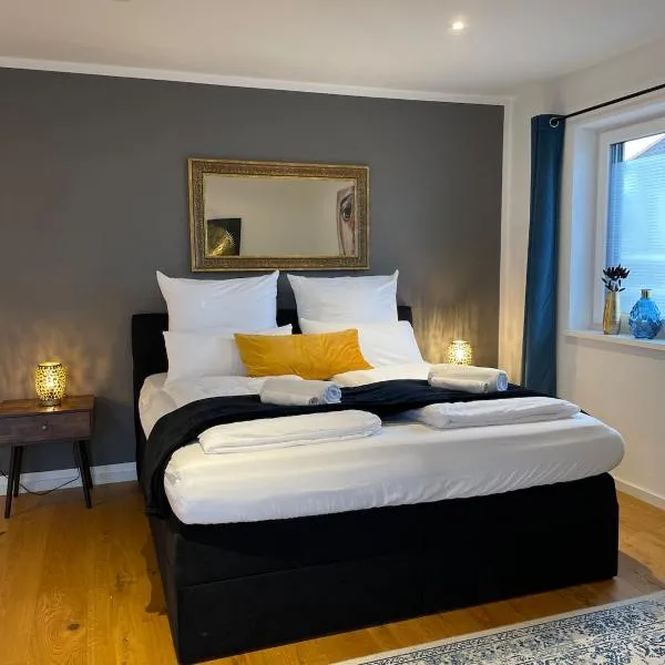 90m2 Loft I Kaffee I Terrasse I E-Parkplatz I 65' Smart TV, hotel v destinaci Rosenheim