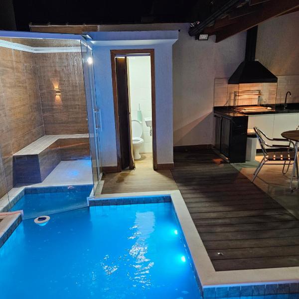 Casa em Boiçucanga com 2 suítes, piscina e sauna integrada