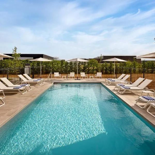 Courtyard by Marriott Lyon Eurexpo Stadium, hôtel à Genas