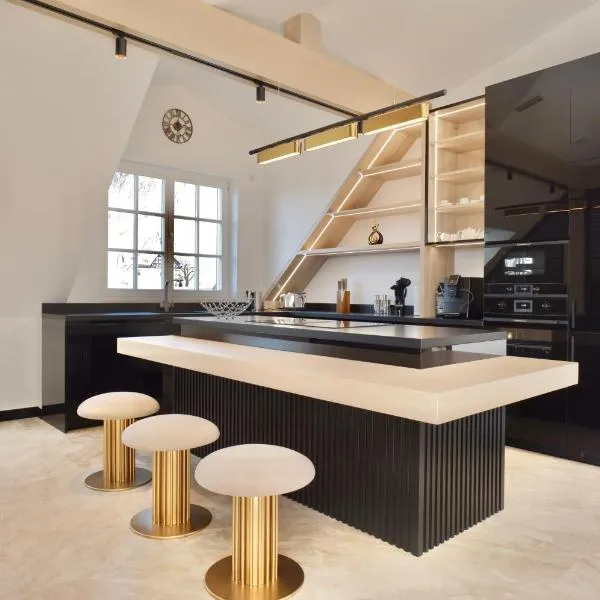 Luxus-Appartments neben Rhein & Reben โรงแรมในบัดฮอนเอฟ อัม ไรน์