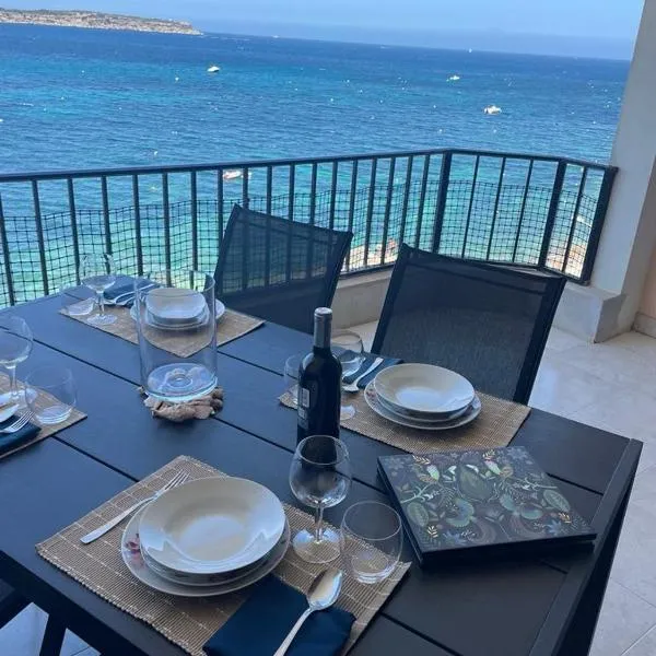 Luxury Seafront Apartment with Panoramic Views- Ghadira, Mellieha Bay, hotel in Is-Sellum