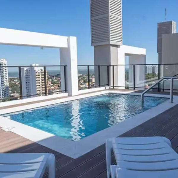 Apartmento con piscina y gimnasio en Asunción, hotel in Asuncion