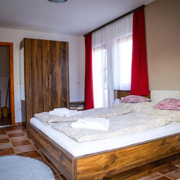 Grüne Oase Apartman โรงแรมในเฮวิซ