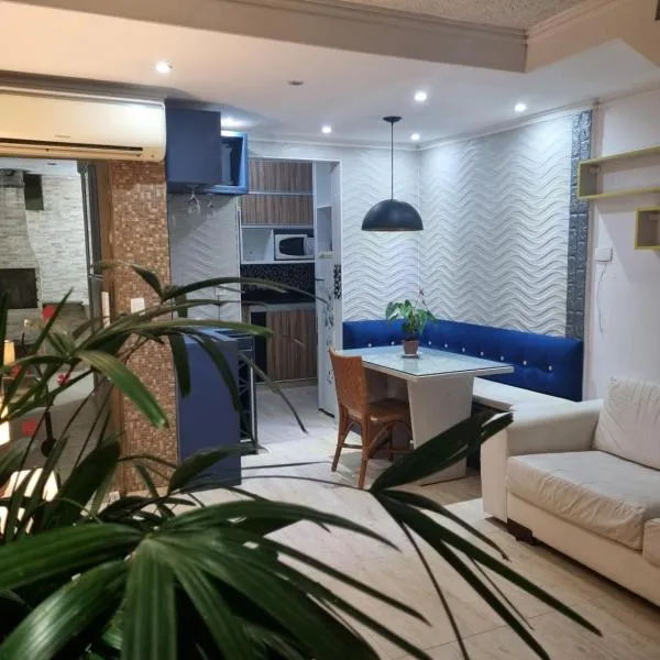 Conforto e facilidade em Bertioga praia centro, hotel in Bertioga
