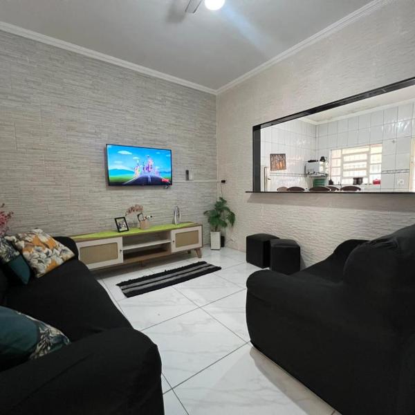 Casa para até 8 pessoas a 5 min da praia com churrasqueira e 3 vagas de garagem - Foto 5