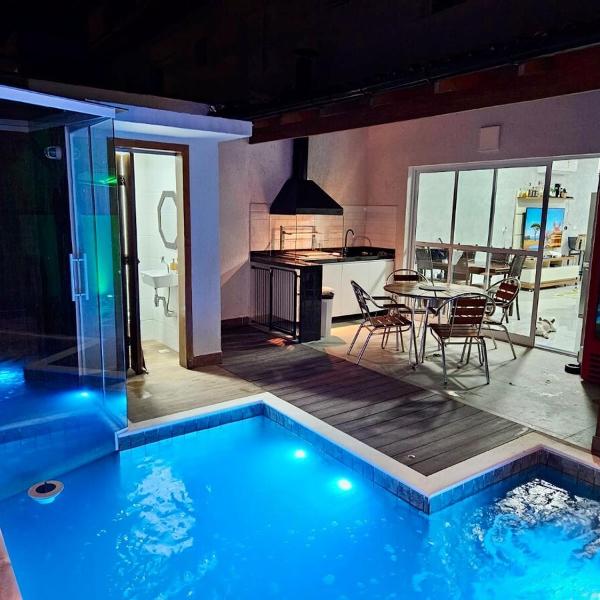 Casa em Boiçucanga com 2 suítes, piscina e sauna integrada