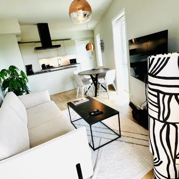 Penthouse Apartment، فندق في كريستيانساند