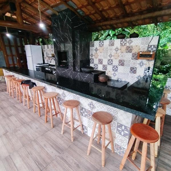 Casa na beira da cachoeira
