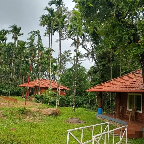 Nature Spot Cottages Coorg, hotel v destinaci Kurchi