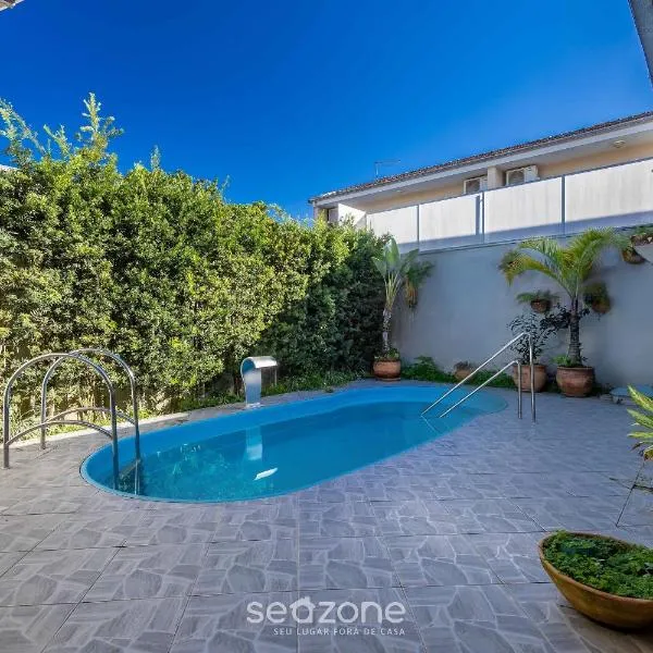 2BR house w/ pool & BBQ in Penha – TZS210, hotel in Penha