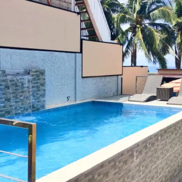 Exclusive Beachfront House with Pool, hotel in Lobo