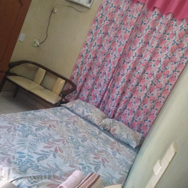 Quarto em casa compartilhada