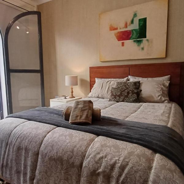 Suite Conforto com ar e wi-fi, super bem localizado