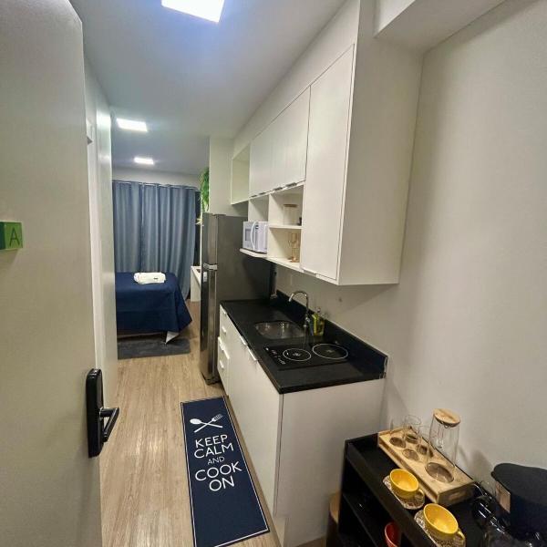 Studio com piscina e vista