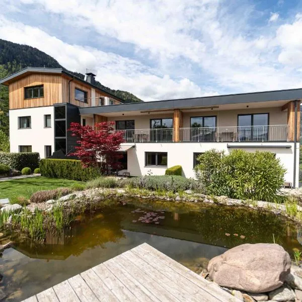 Felsenegg appartements - moderne Wohnungen im Luftkurort mit traumhaftem Garten Nähe Meran für Paare und Familien, хотел в Волан